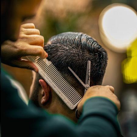 Comb and scissors shaping the top