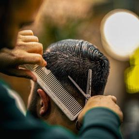 Comb and scissors on the top